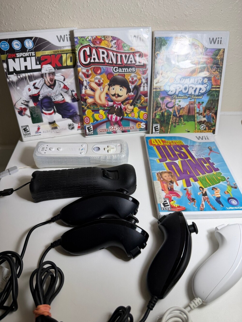 Nintendo Wii Controllers and Games Bundle with MotionPlus and Nunchuks